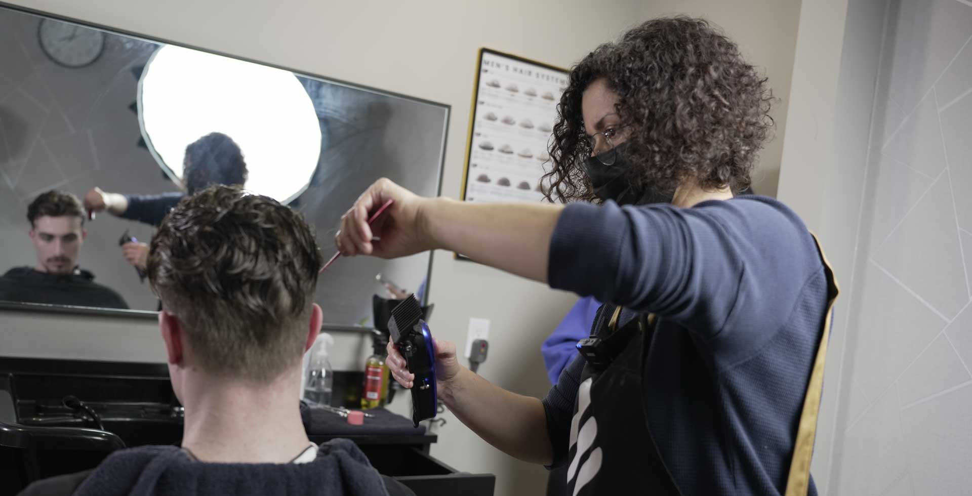 styling the hairpiece or toupee